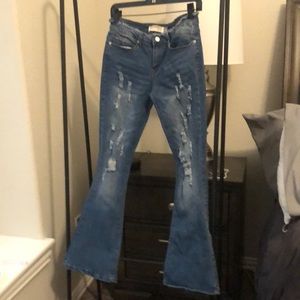 Celebrity ace distressed bell bottom/ flare jeans